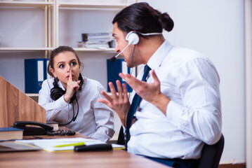 Fototapeta premium Call center operators working in the office