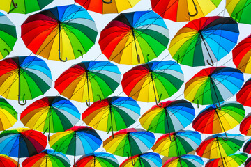 Bright colored umbrellas as a background