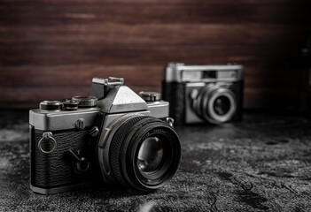Film retro cameras with shallow depth of field. Camera technology and photography concept with a vintage look with copy space.