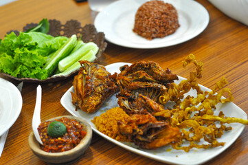 Nasi timbel ayam goreng, a traditional cuisine from Indonesia