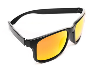 Modern stylish black sunglasses with orange lenses with UV protection isolated on white background