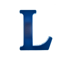 Plastic letter L on magnet isolated on white background, top view