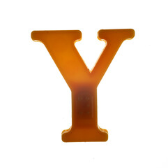 Plastic letter Y on magnet isolated on white background, top view