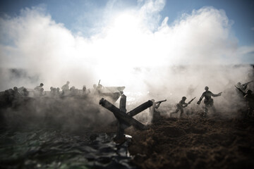 World War 2 reenactment (D-day). Creative decoration with toy soldiers, landing crafts and...