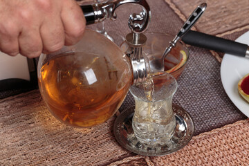 Making herbal tea with a vacuum siphon.
