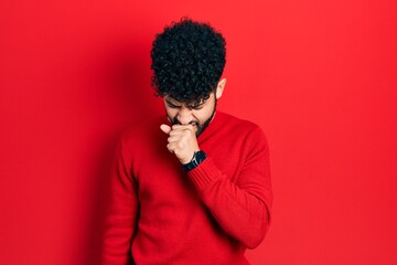 Fototapeta na wymiar Young arab man with beard wearing casual red sweater feeling unwell and coughing as symptom for cold or bronchitis. health care concept.