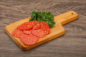 Italian spycy pepperoni sausage slices