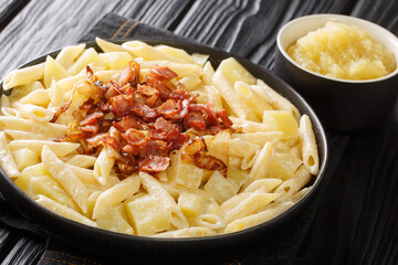 Alpine style macaroni with apple puree closeup in the plate. horizontal