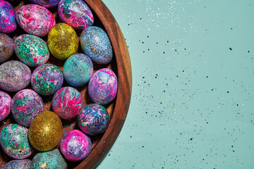 Many colorful shiny eggs. Concept of Happy Easter.