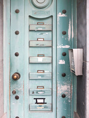 old door with letterboxes