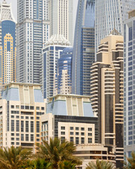Fototapeta na wymiar Bunch of buildings in Dubai Marina: a modern district in Dubai, United Arab Emirates.