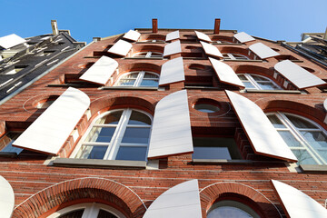 shutters on amsterdam historic warehouses