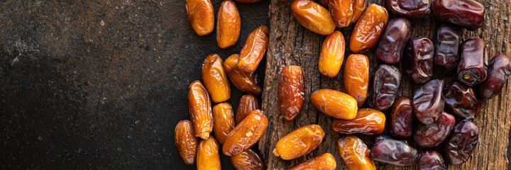 date fruit sweet dried fruits tasty healthy snack diet top view copy space  vegan or vegetarian rustic food background keto or paleo diet 