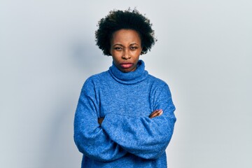 Young african american woman wearing casual clothes skeptic and nervous, disapproving expression on...