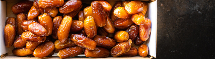 date fruit sweet dried fruits tasty healthy snack diet top view copy space  vegan or vegetarian rustic food background keto or paleo diet 