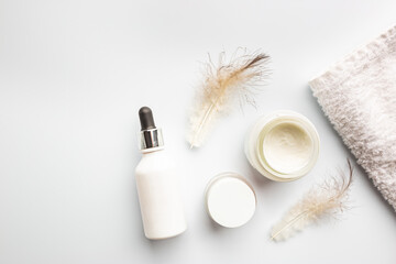 Fototapeta na wymiar Flat lay composition with skin care products on white background