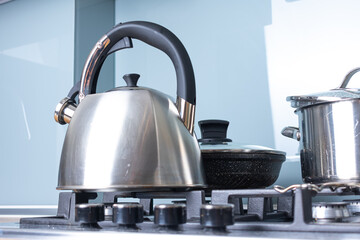 stainless steel kettle on gas stove