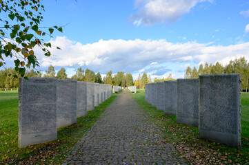 Alley of steles with the names of the buried at the German military cemetery at the Memorial complex "Peace Park", Rzhev, Tver region, Russian Federation, September 19, 2020