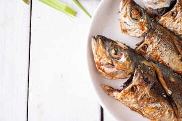Deep fried mackerel with fish sauce, Traditional Thai food.
