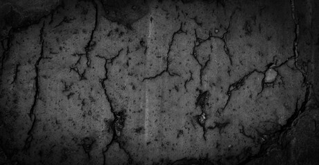 Obraz na płótnie Canvas macro photo of black brick with visible texture. background