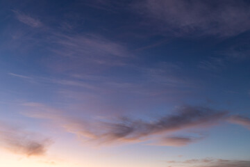 Naklejka na ściany i meble Blue sky with clouds at twilight time.
