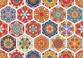 Patchwork seamless pattern with colorful hexagon mandalas and white seams. Vector illustration