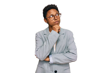 Young african american woman wearing business clothes with hand on chin thinking about question, pensive expression. smiling with thoughtful face. doubt concept.