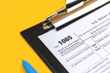 US tax form 1065 Return of Partnership Income background