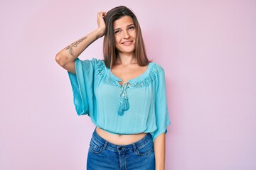 Beautiful caucasian woman wearing casual clothes confuse and wonder about question. uncertain with...