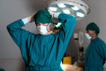 Obraz na płótnie Canvas Medical Team Performing Surgical Operation in Operating Room. Doctor and team have skilled and recognized.