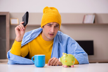 Young man suffering at home in expensive medicine concept