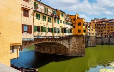 Fototapeta na wymiar The Ponte Vecchio Bridge over the Arno River in Florence Italy