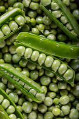 Fresh green peas. Close-up. Top view. Fresh green peas pods.