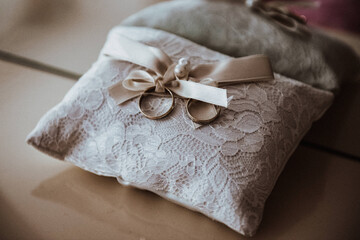 pillow with wedding rings