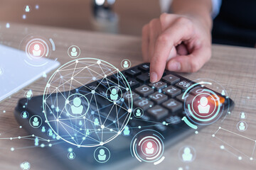 Fototapeta premium HR specialist researching and analyzing the data of salary on employment market to forecast ongoing expenses of the company. Hiring new talented officers. Social media hologram icons. Woman hand.
