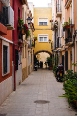 Fototapeta na wymiar Colored cute spanish little street in a small village of east Spain.