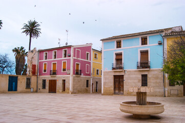 Facade of houses of different living colors typical in Spain.