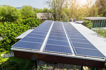 Solar photovoltaic panels on roof house.