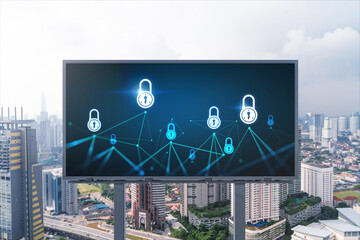 Padlock icon hologram on road billboard over panorama city view of Kuala Lumpur at day time to protect business, Malaysia, Asia. The concept of information security shields.