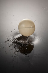 Splash in water surface after falled ball