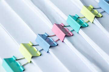 Piles of white papers work large piles of papers stacked together. On the desk in the office with...