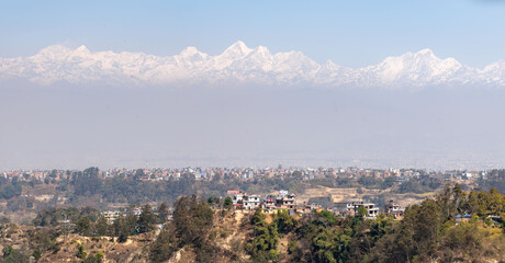 Himalaya Mountains with City in Foreground
