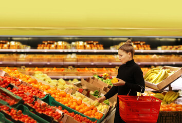 Woman buying fruits at the market