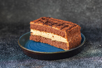 gluten free cake piece sugar-free and lactose free chocolate cream layers trend meal copy space food background rustic. top view