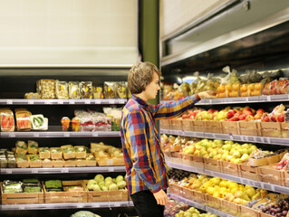 Man buying fruits at the market.