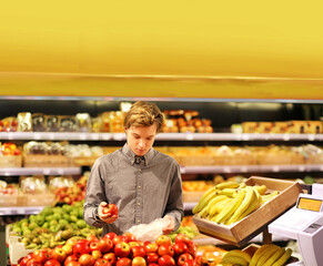 Man buying fruits at the market.