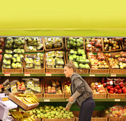 Woman buying fruits at the market