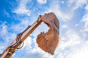 bucket filled with soil under blue sky