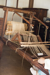 a traditional frame for weaving silk, cotton, ramie, hemp.