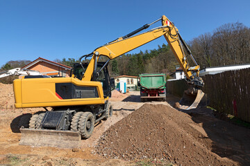 crane and lorry at a construction side